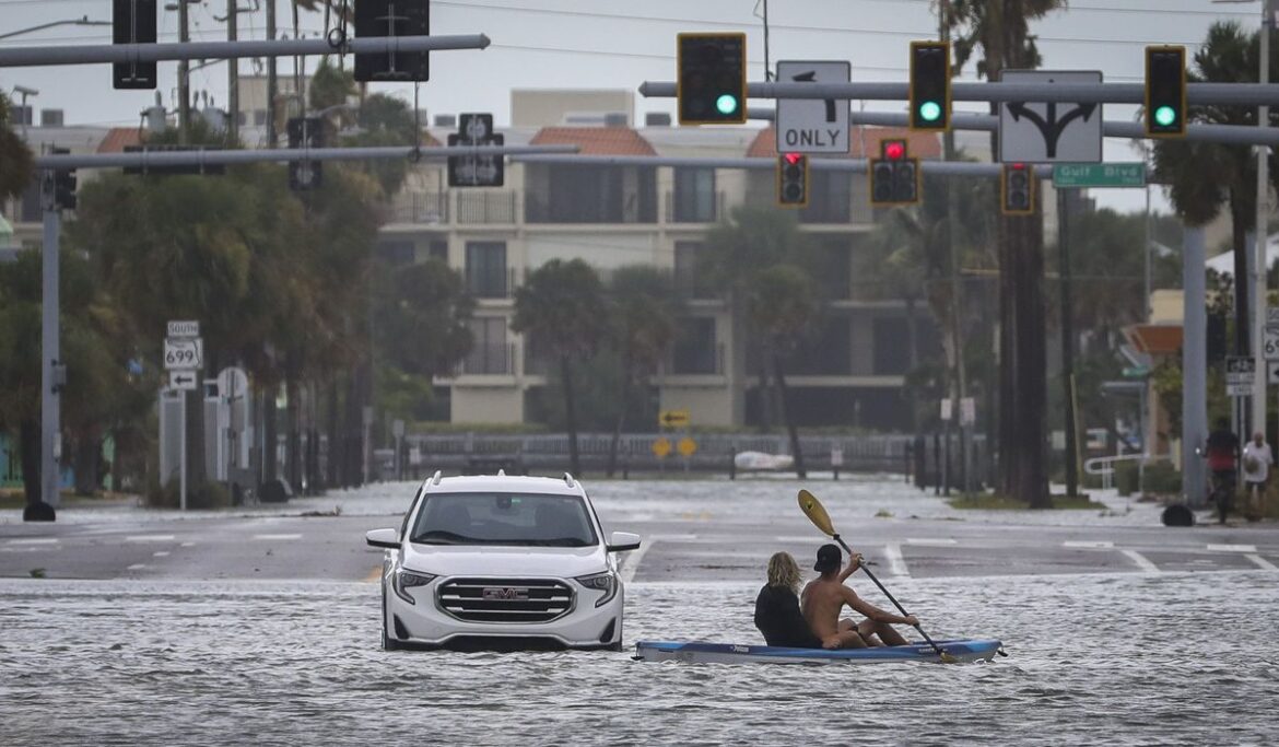 Hurricane Idalia hits Florida with 125 mph winds, flooding streets, snapping trees and cutting power