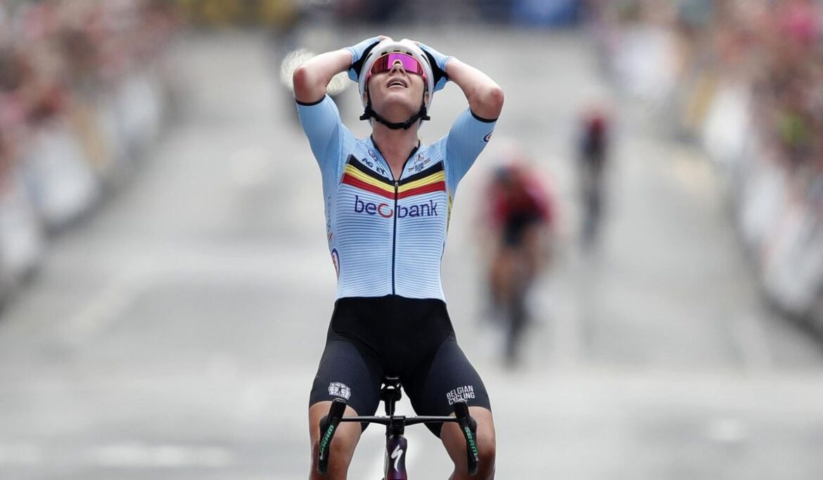 Lotte Kopecky makes it a trifecta of world title gold medals with her road race win in Scotland