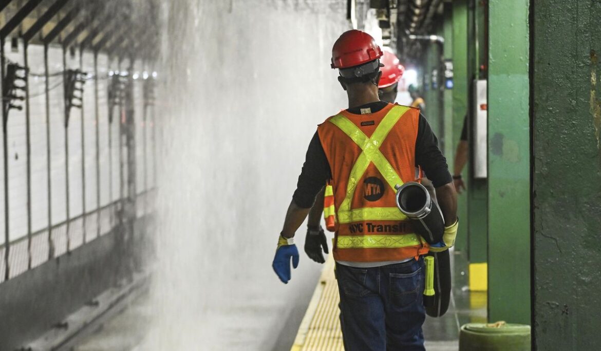 New York City streets, subway flood as 127-year-old water main breaks under Times Square