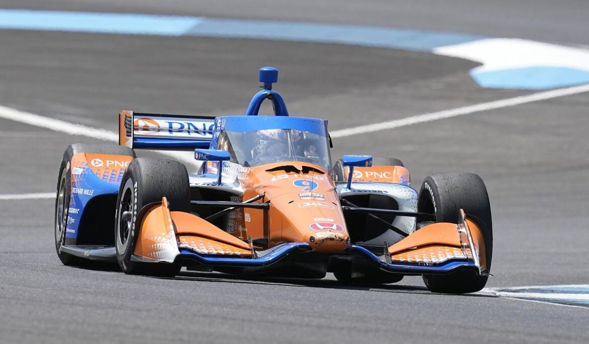 Scott Dixon holds off hard-charging Rahal to win Indianapolis GP on record-breaking day