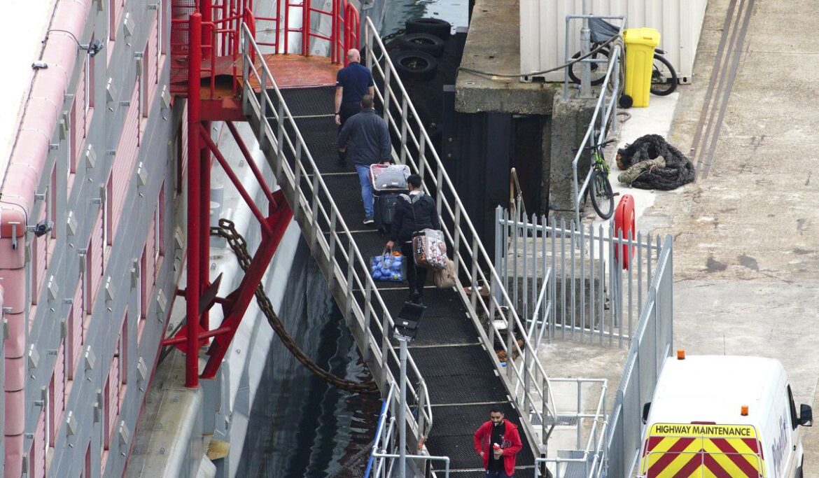 U.K. gov't rejects claims it was slow to evacuate asylum seekers after bacteria detected on barge