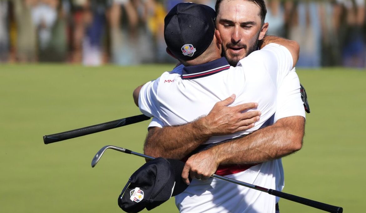 After 28 hours, the U.S. finally wins a full point at the Ryder Cup with rookies Homa and Harman