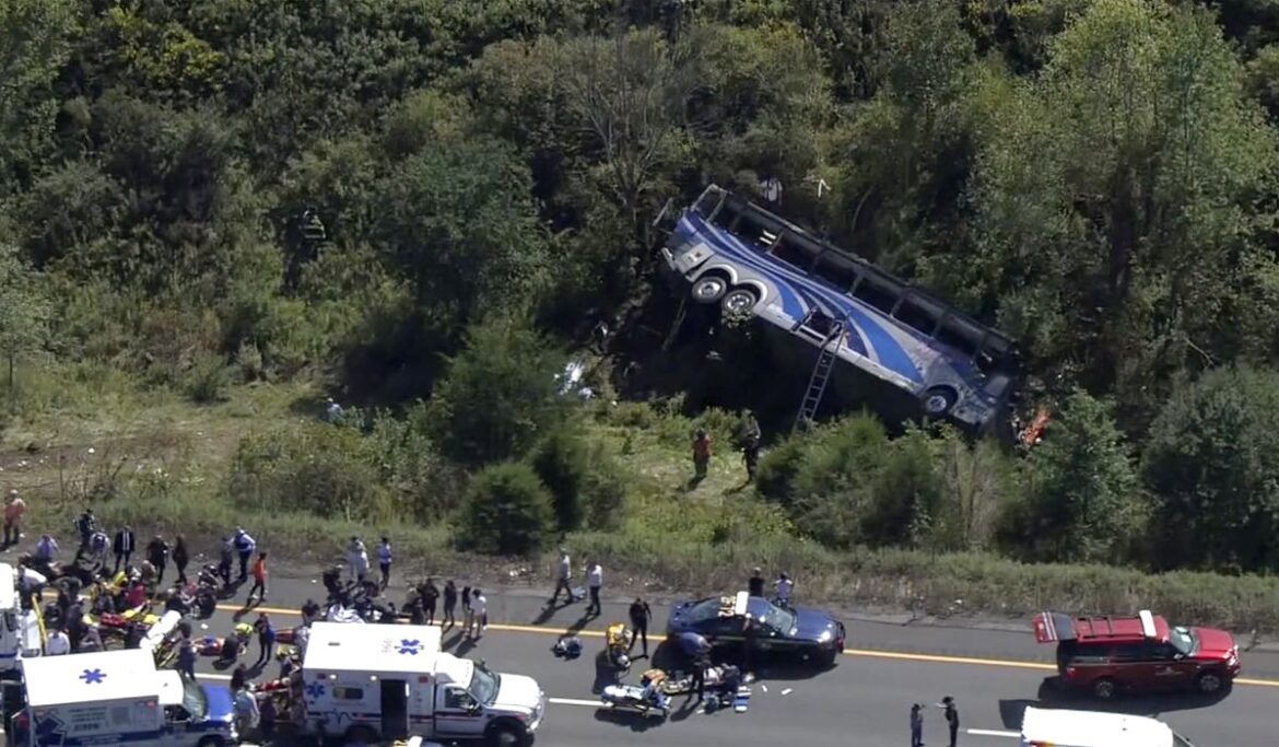 Bus carrying high school students to band camp crashes, killing 2 and seriously injuring others