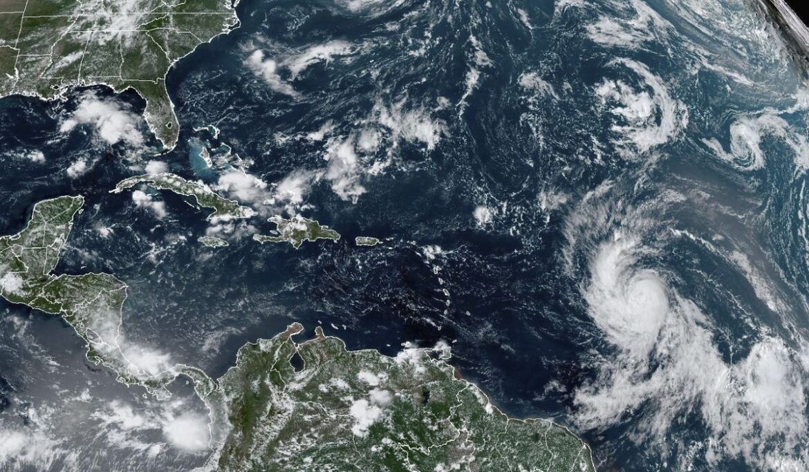 Hurricane Lee charges over Atlantic waters as a Category 5 storm, approaching the Caribbean