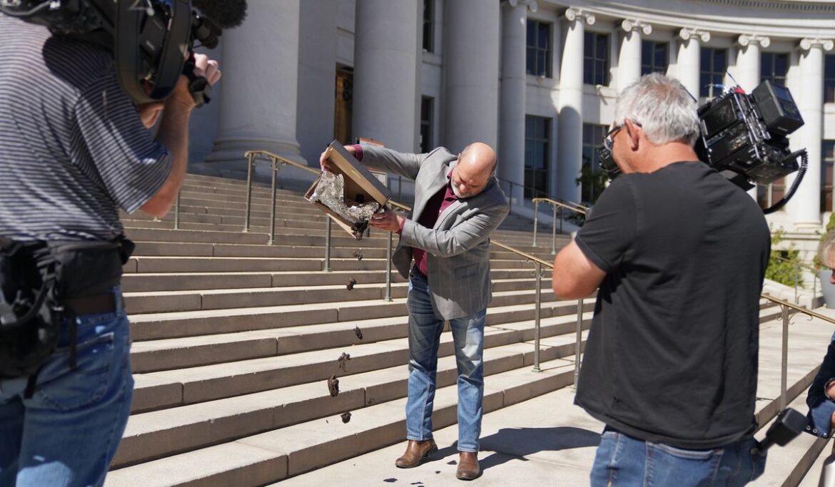 Jon Caldara, Independence Institute CEO, dumps human poop from homeless on Denver city hall steps