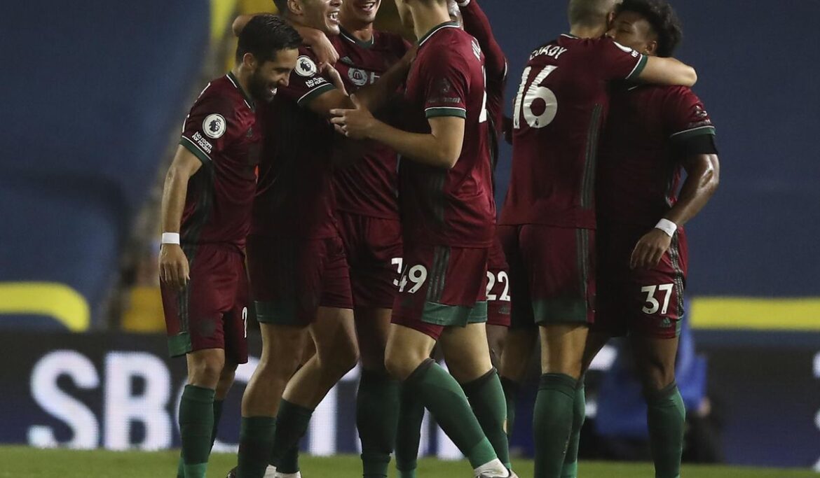 Luton earns its first Premier League point in 1-1 draw with 10-man Wolves