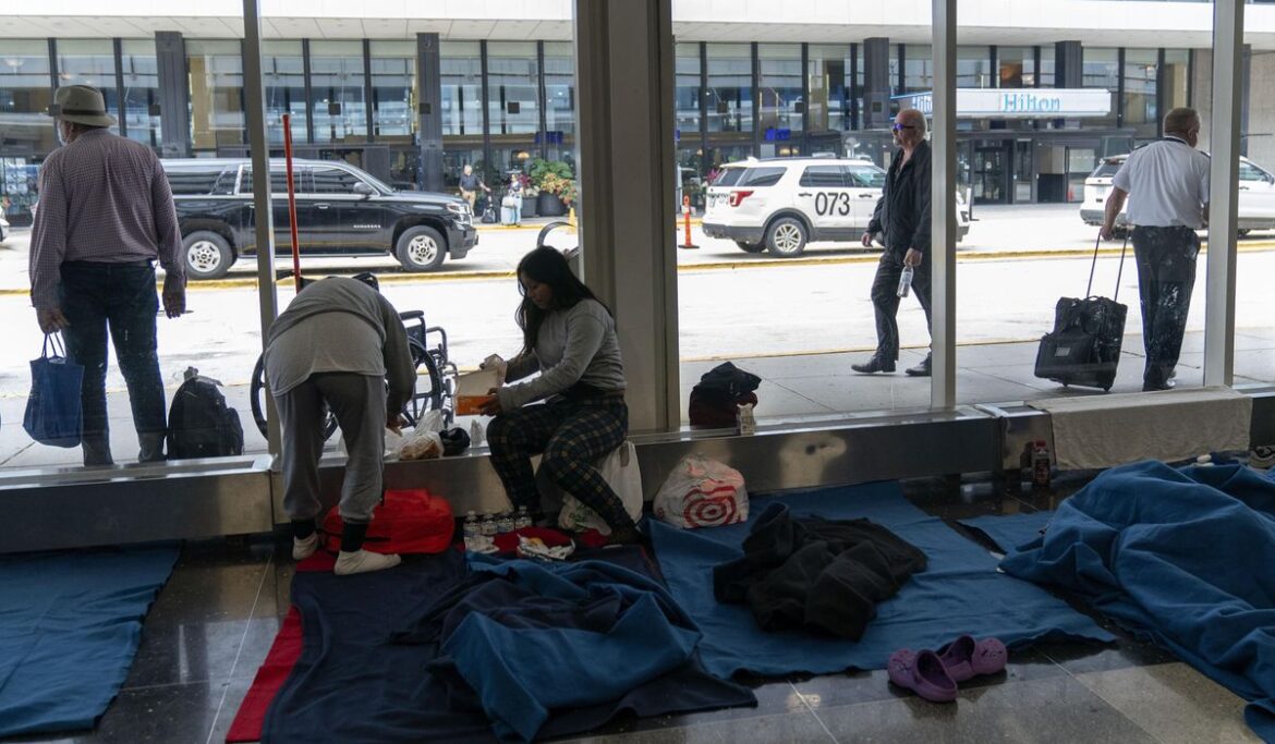 Chicago is keeping hundreds of migrants at airports while waiting on shelters and tents