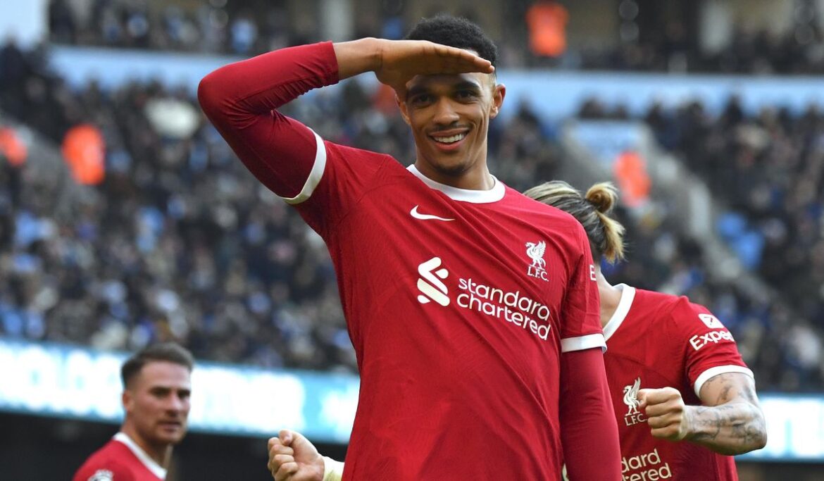 Alexander-Arnold earns Liverpool 1-1 draw against Man City. Haaland sets scoring record