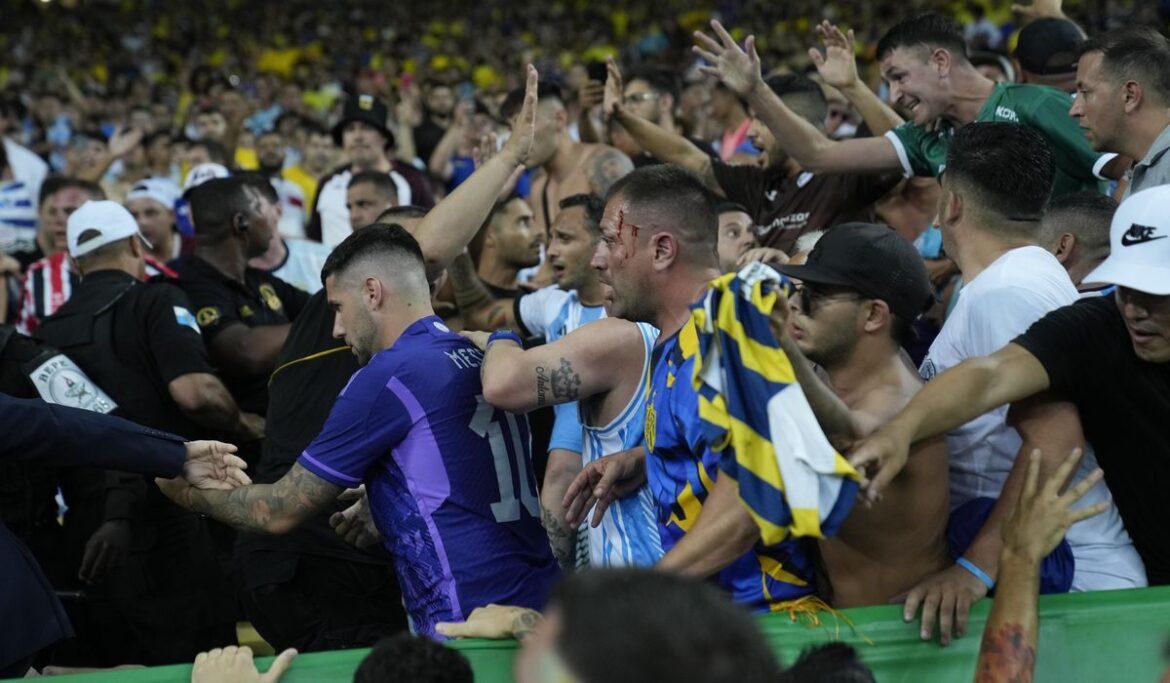 Argentina and Brazil charged by FIFA after fan violence delays World Cup qualifying game at Maracana