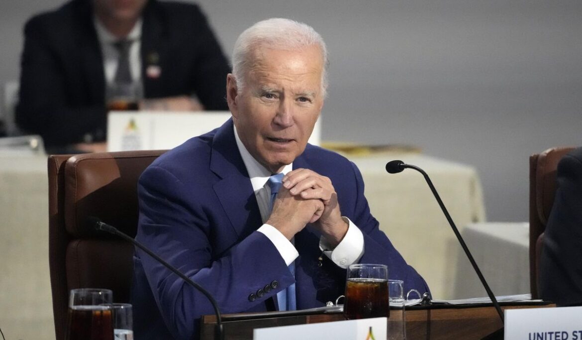 Biden signs temporary spending bill averting government shutdown, pushing budget fight into new year