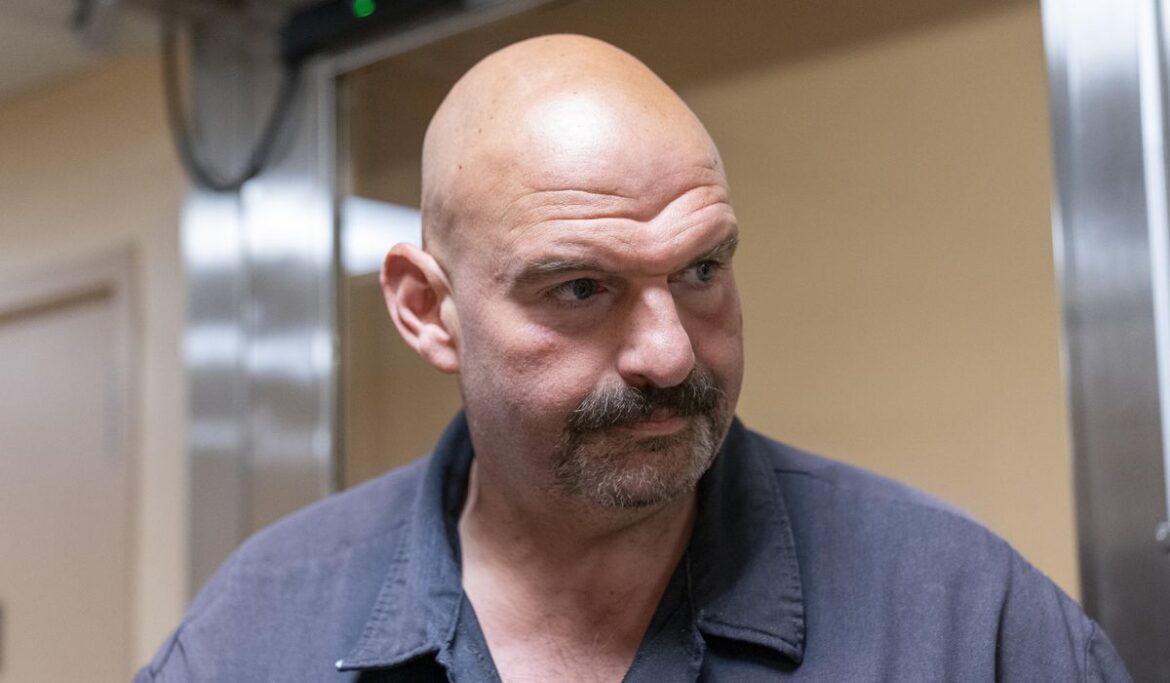 John Fetterman waves Israeli flag at protesters calling for a cease-fire