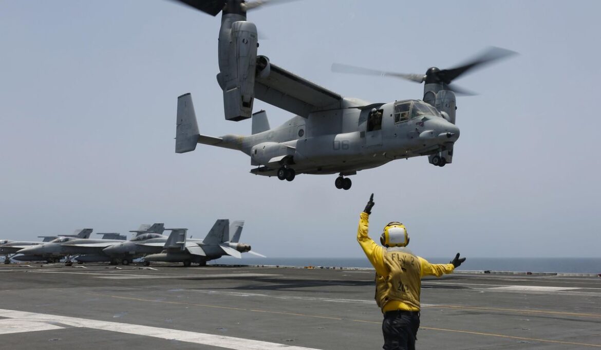 Air Force secretary posthumously promotes pilot of Osprey aircraft that crashed off Japan