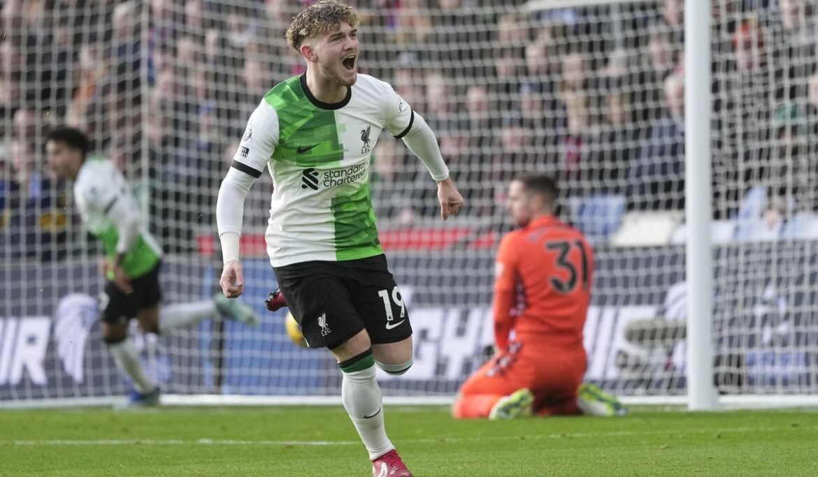 Elliott scores in stoppage time and Liverpool beats Palace 2-1 to move to top of Premier League