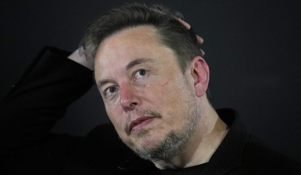 Elon Musk lashes out at media for robot attack story